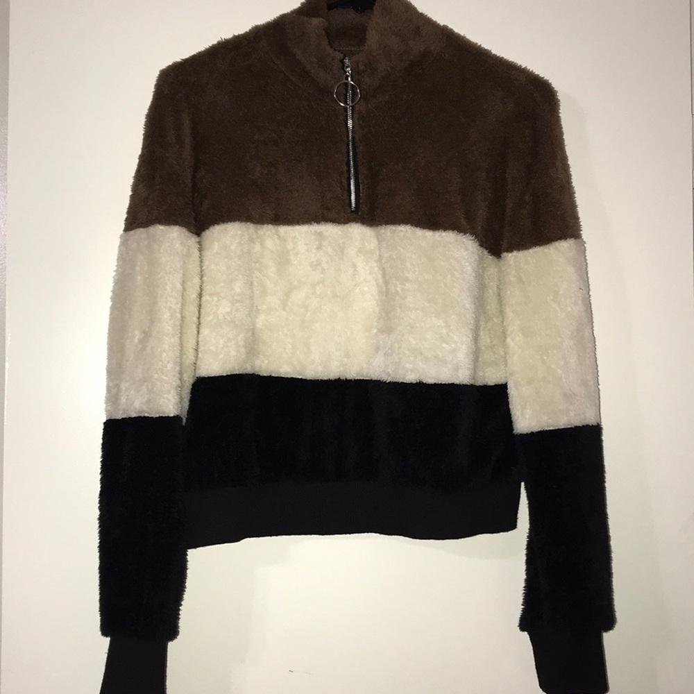 Fluffy, zip up, sweater/shirt, never worn.
